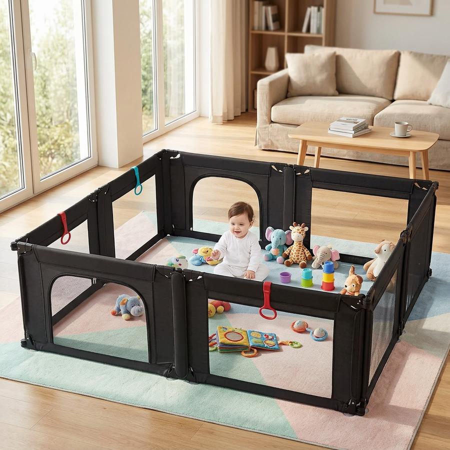 Drop-rail playpen with toddler standing inside